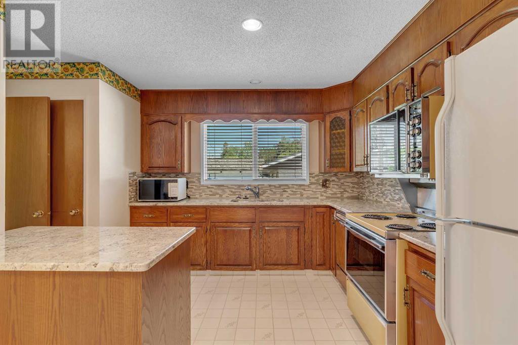 Single Family House Bungalow for Sale in  Valiant Drive NW Varsity Calgary 