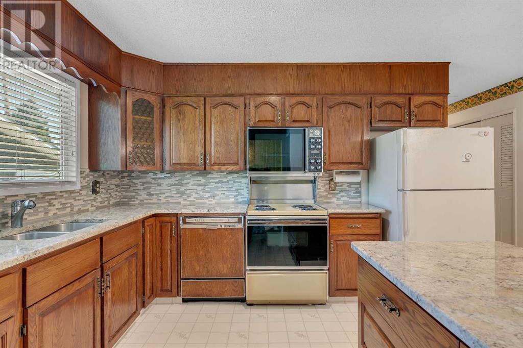 Single Family House Bungalow for Sale in  Valiant Drive NW Varsity Calgary 
