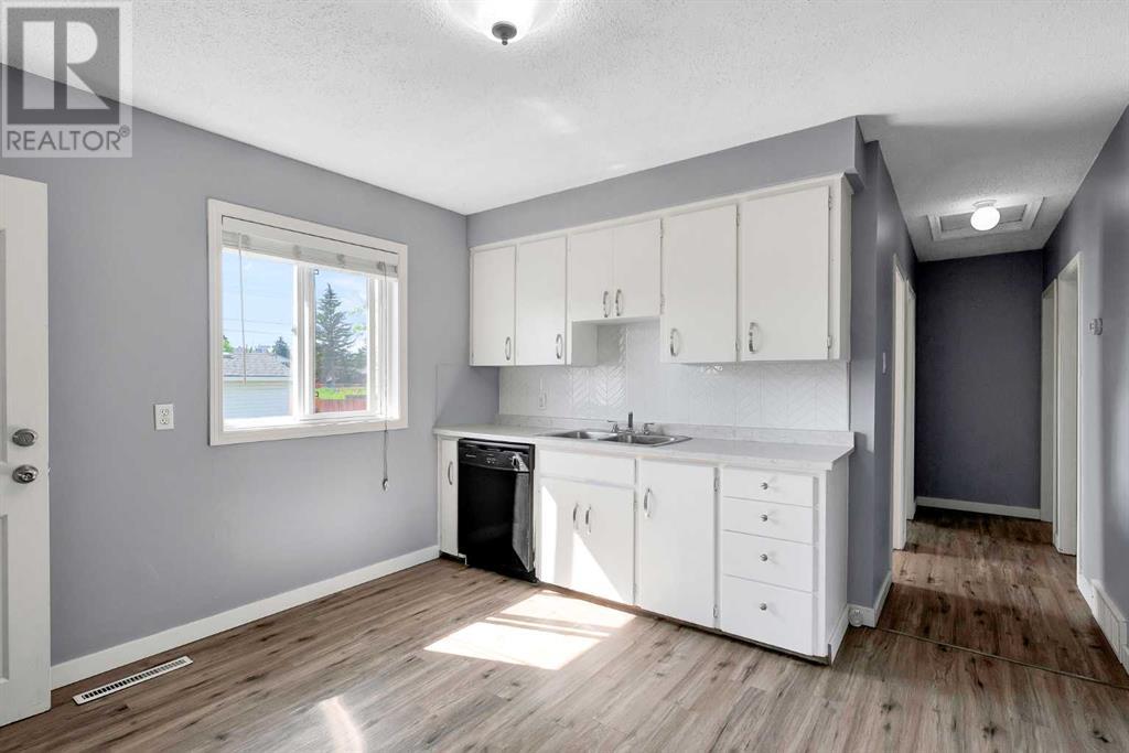 Single Family House Bungalow for Sale in   Street SE Forest Lawn Calgary 