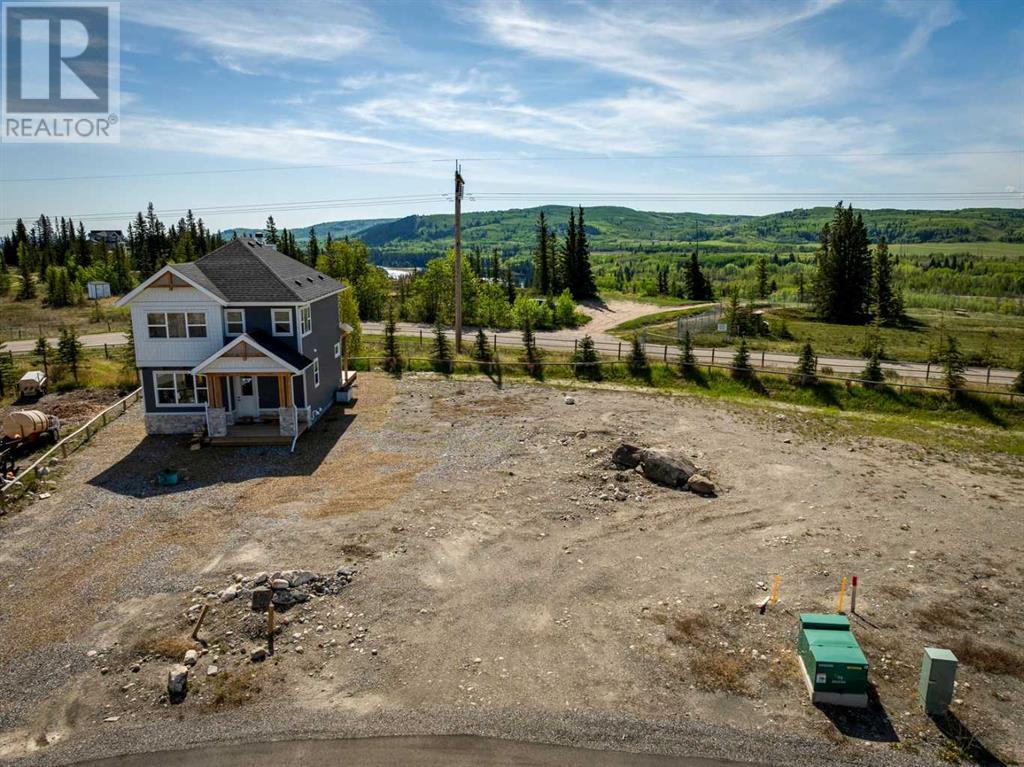 Photo 3 of 605 Cottageclub Bend, Rural Rocky View County AB