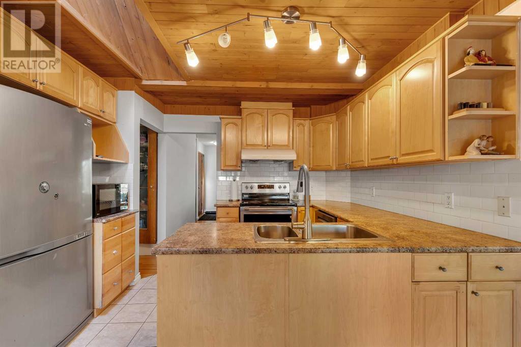 Single Family House Bungalow for Sale in  Brantford Drive NW Brentwood Calgary 