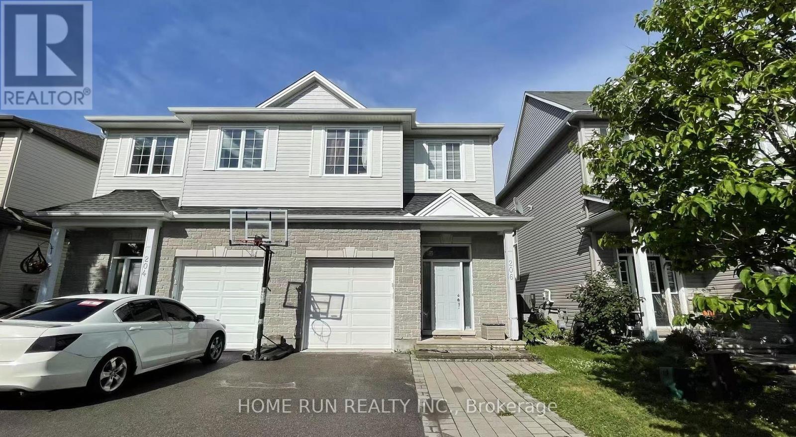 Charming 2-storey semi with brick & vinyl exterior