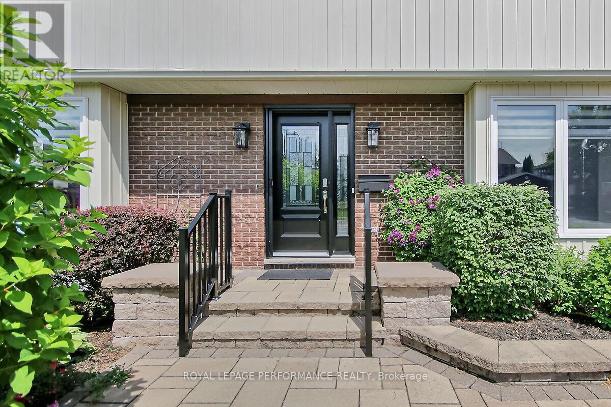 Lovely landscaped front entrance.