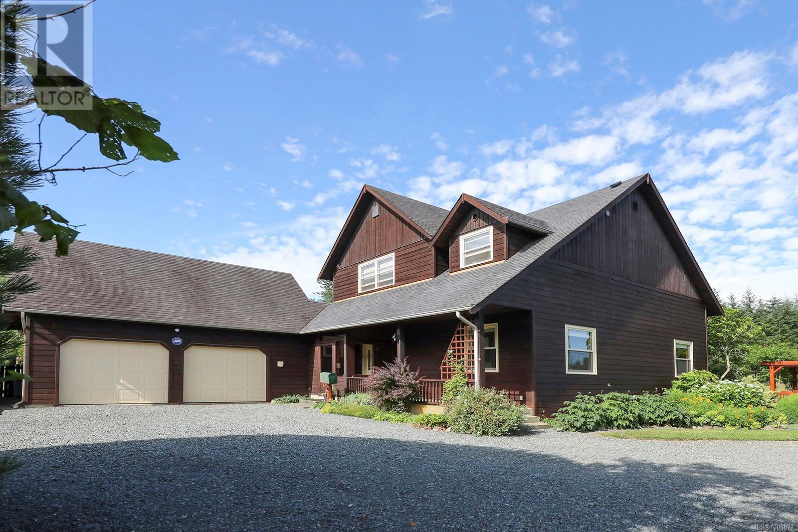 Photo 27 of 3713 Dove Creek Rd, Courtenay BC