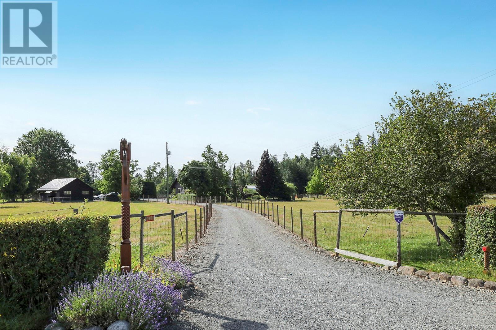 Photo 37 of 3713 Dove Creek Rd, Courtenay BC