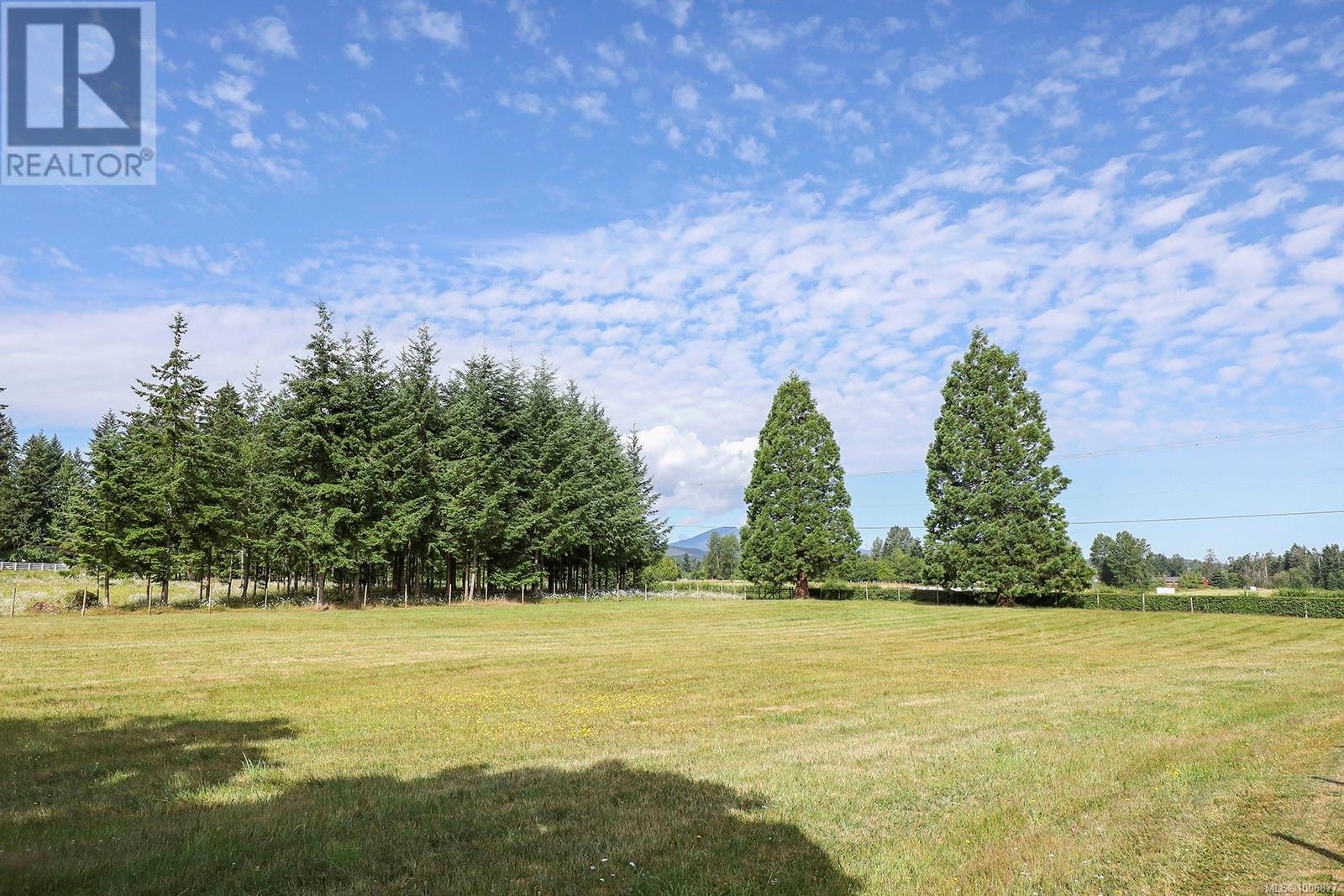 Photo 29 of 3713 Dove Creek Rd, Courtenay BC