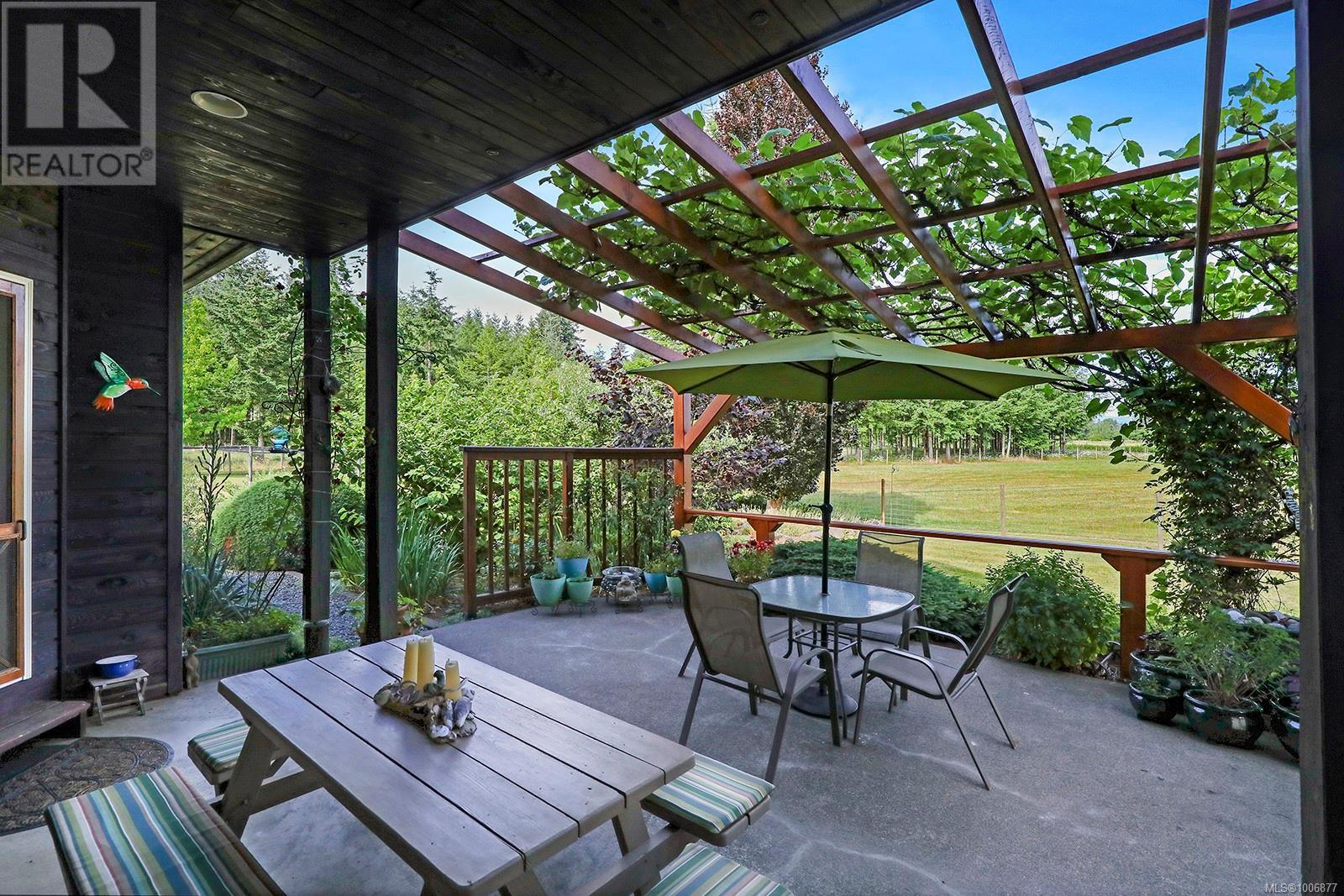 Photo 34 of 3713 Dove Creek Rd, Courtenay BC