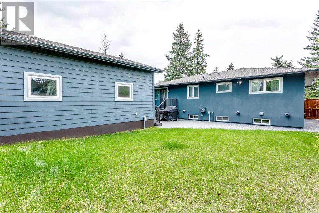 Single Family House Bungalow for Sale in  Wimbledon Crescent SW Wildwood Calgary 