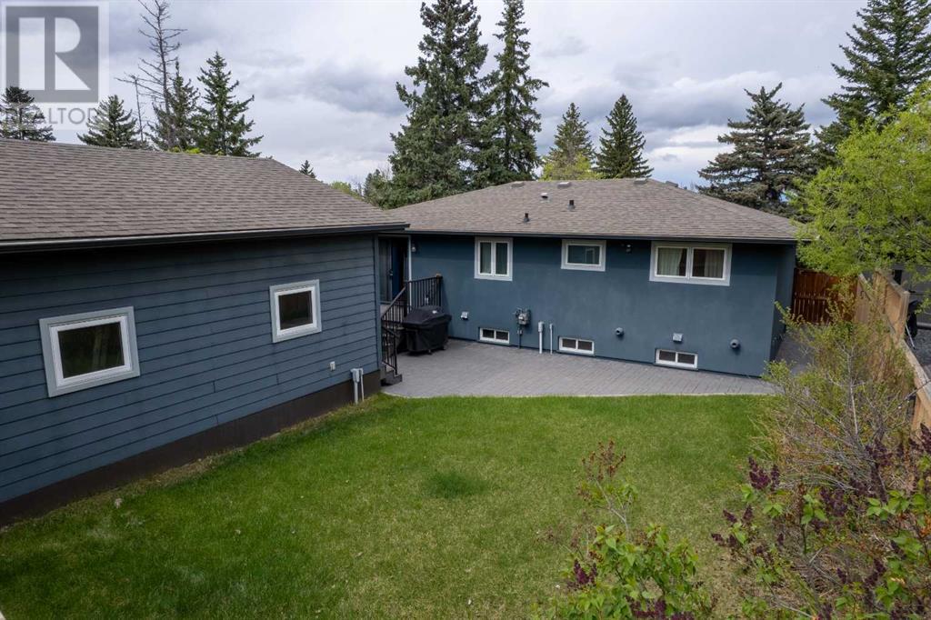Single Family House Bungalow for Sale in  Wimbledon Crescent SW Wildwood Calgary 