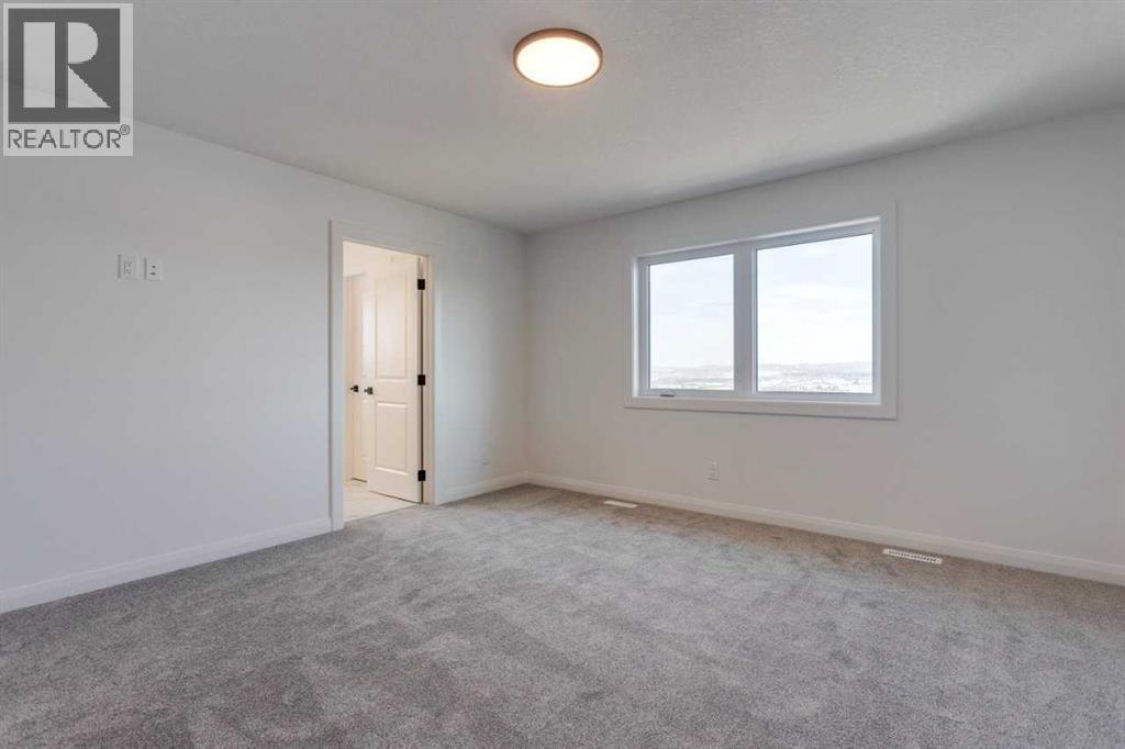 Photo 3 of 271 Rivercrest Boulevard, Cochrane AB