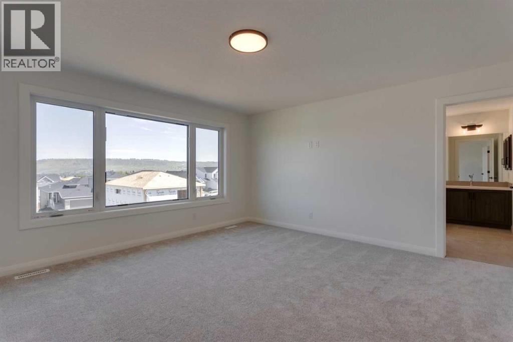 Photo 5 of 275 Rivercrest Boulevard, Cochrane AB