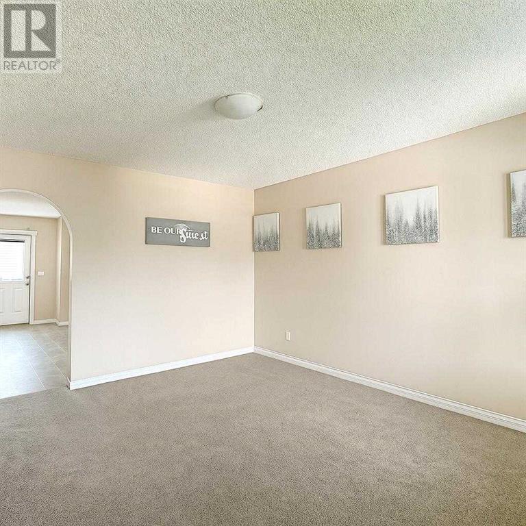 Photo 1 of 143 Cimarron Grove Circle, Okotoks AB