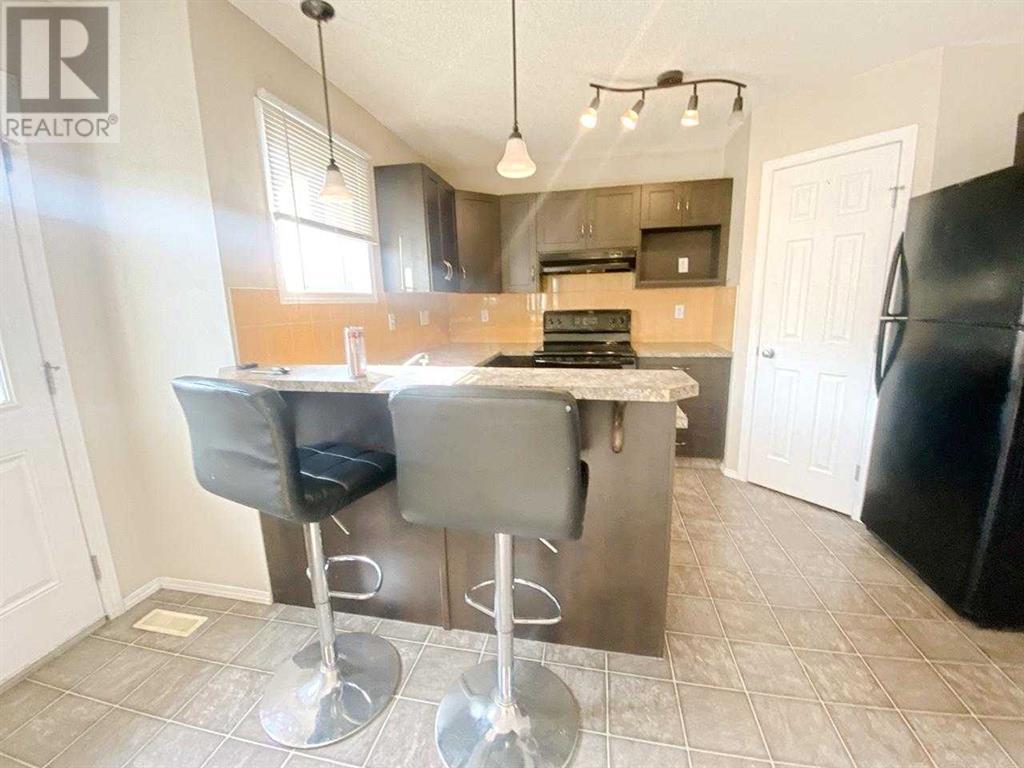 Photo 19 of 143 Cimarron Grove Circle, Okotoks AB