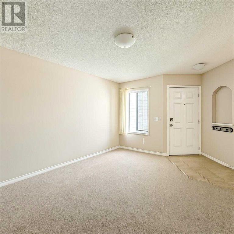 Photo 12 of 143 Cimarron Grove Circle, Okotoks AB