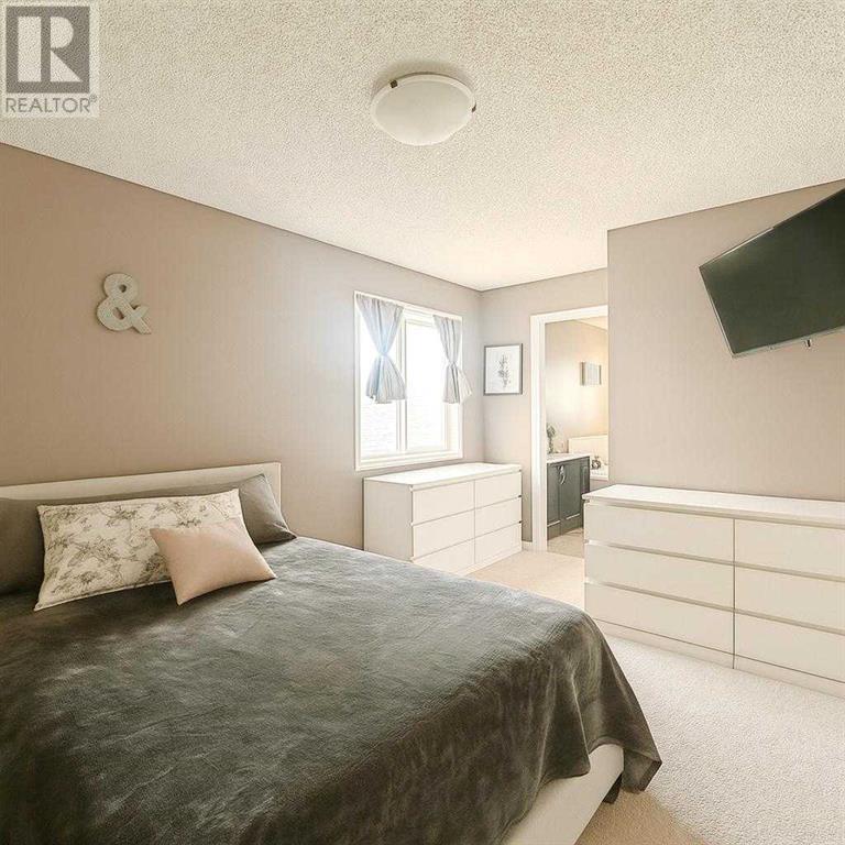 Photo 4 of 143 Cimarron Grove Circle, Okotoks AB