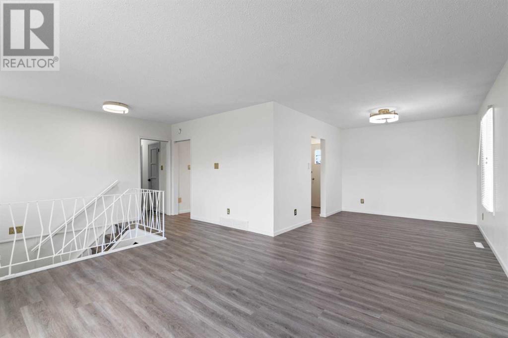 Single Family House Bi-level for Sale in  Harmon Place SW Haysboro Calgary 