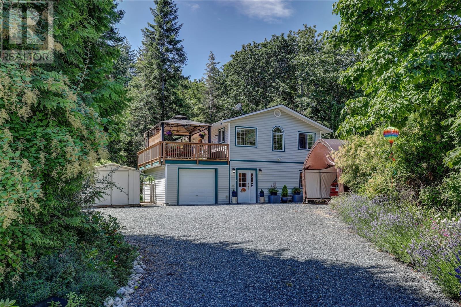 Photo 7 of 4840 Blue Heron Dr, Bowser BC