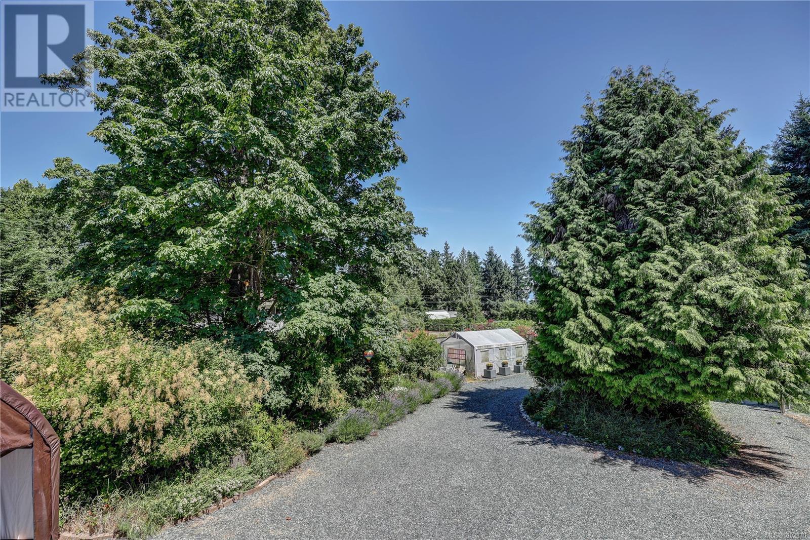 Photo 69 of 4840 Blue Heron Dr, Bowser BC
