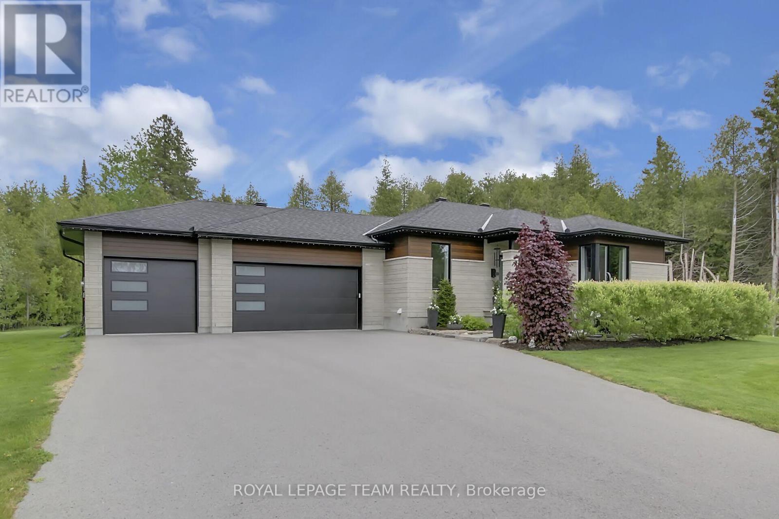 Massive 3 car garage for vehicles and toys!!