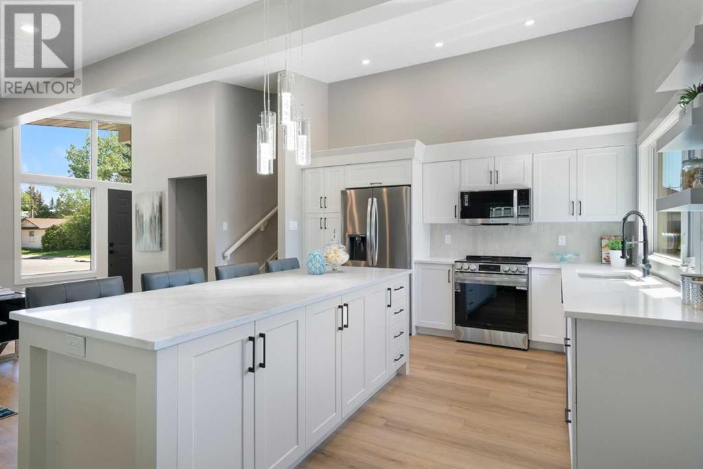 Single Family House 4 Level for Sale in  Lake Bonavista Drive SE Lake Bonavista Calgary 