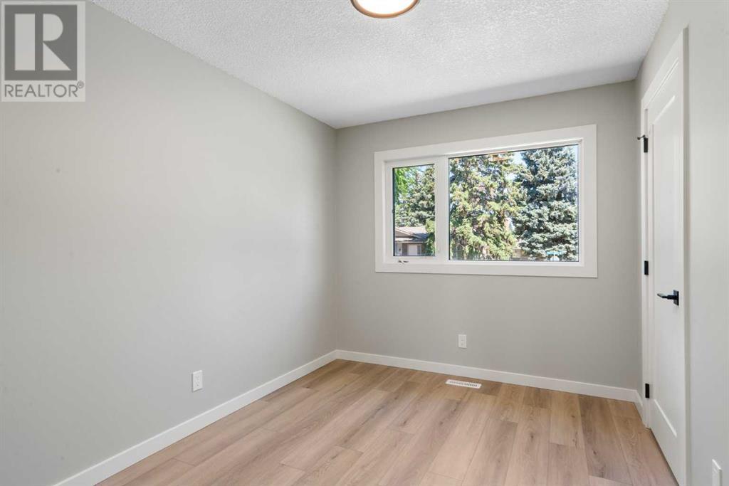 Single Family House 4 Level for Sale in  Lake Bonavista Drive SE Lake Bonavista Calgary 