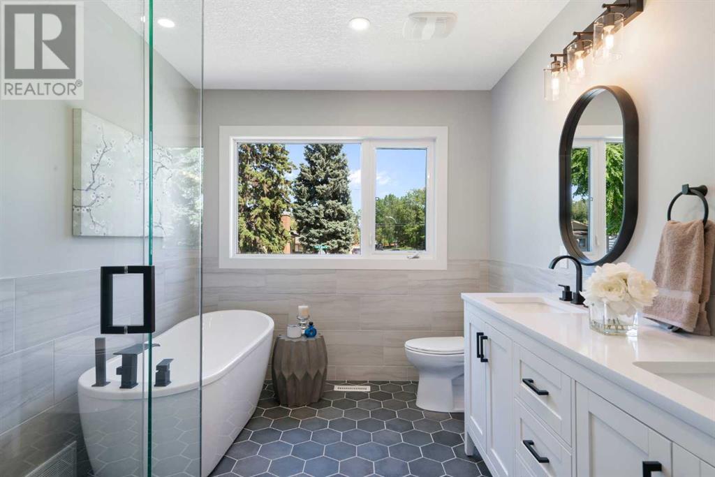 Single Family House 4 Level for Sale in  Lake Bonavista Drive SE Lake Bonavista Calgary 