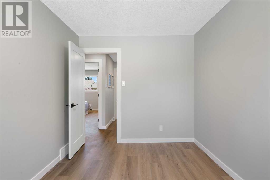 Single Family House 4 Level for Sale in  Lake Bonavista Drive SE Lake Bonavista Calgary 