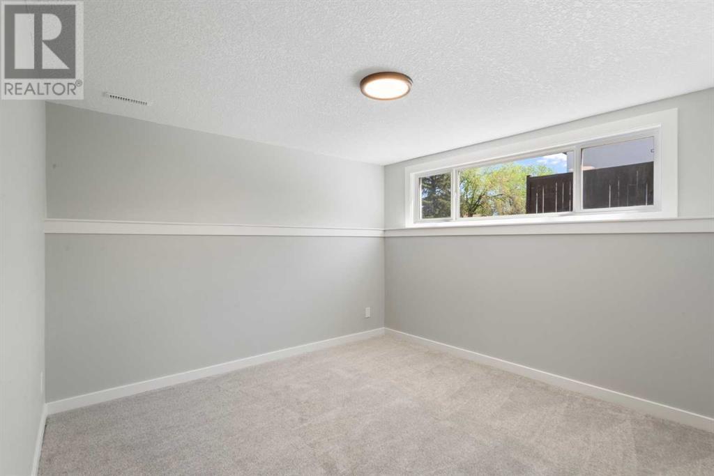 Single Family House 4 Level for Sale in  Lake Bonavista Drive SE Lake Bonavista Calgary 