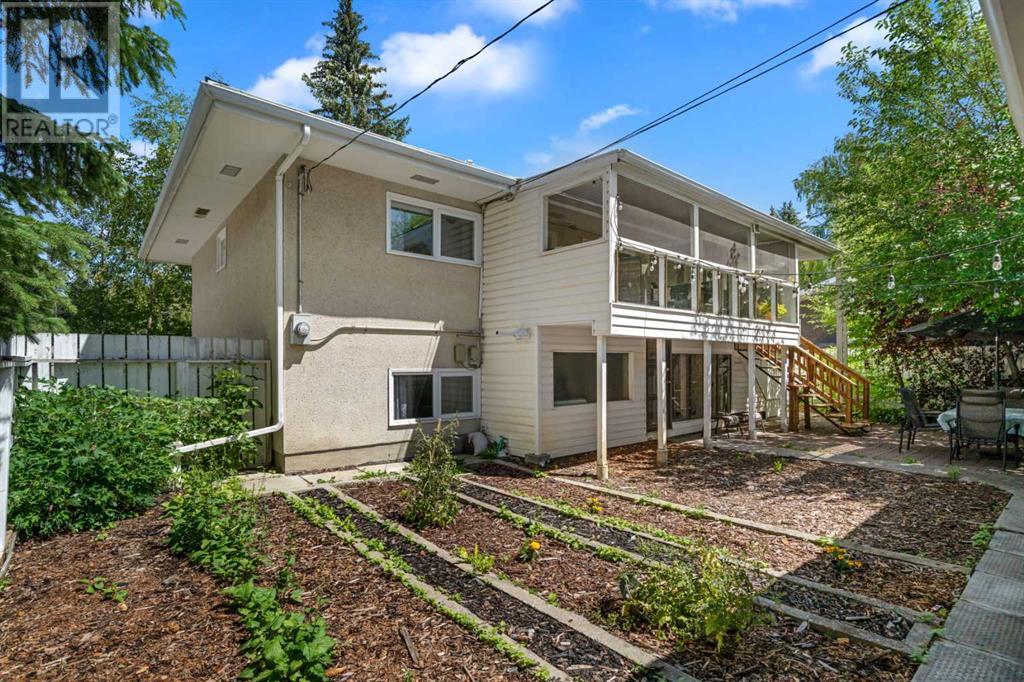 Single Family House Bi-level for Sale in  Bearspaw Drive NW Brentwood Calgary 