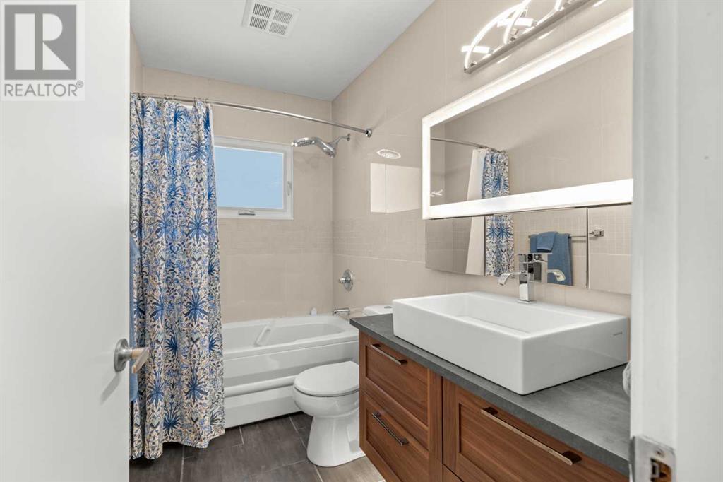 Single Family House Bi-level for Sale in  Bearspaw Drive NW Brentwood Calgary 