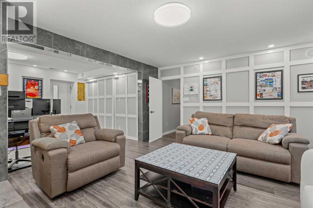 Single Family House Bi-level for Sale in  Bearspaw Drive NW Brentwood Calgary 
