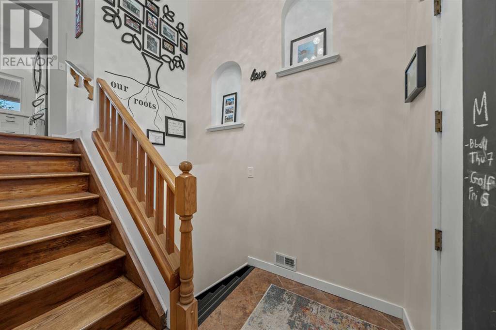 Single Family House Bi-level for Sale in  Bearspaw Drive NW Brentwood Calgary 