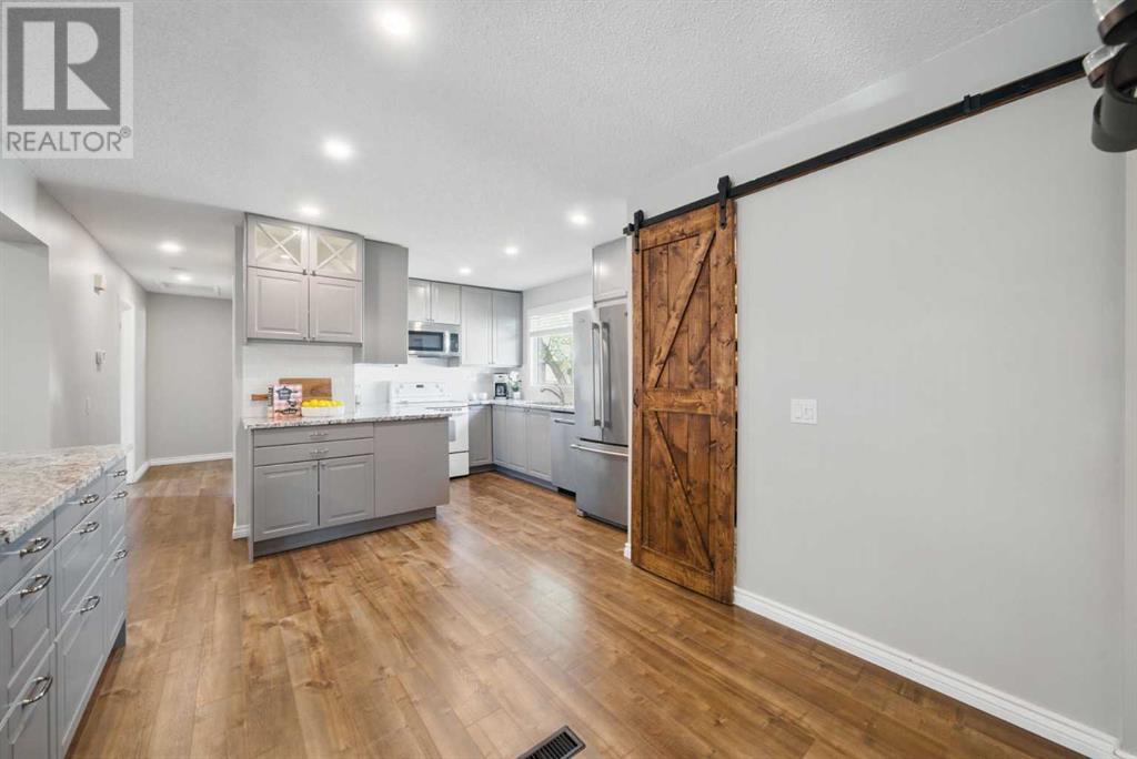 Single Family House Bungalow for Sale in  Hunterston Crescent NW Huntington Hills Calgary 