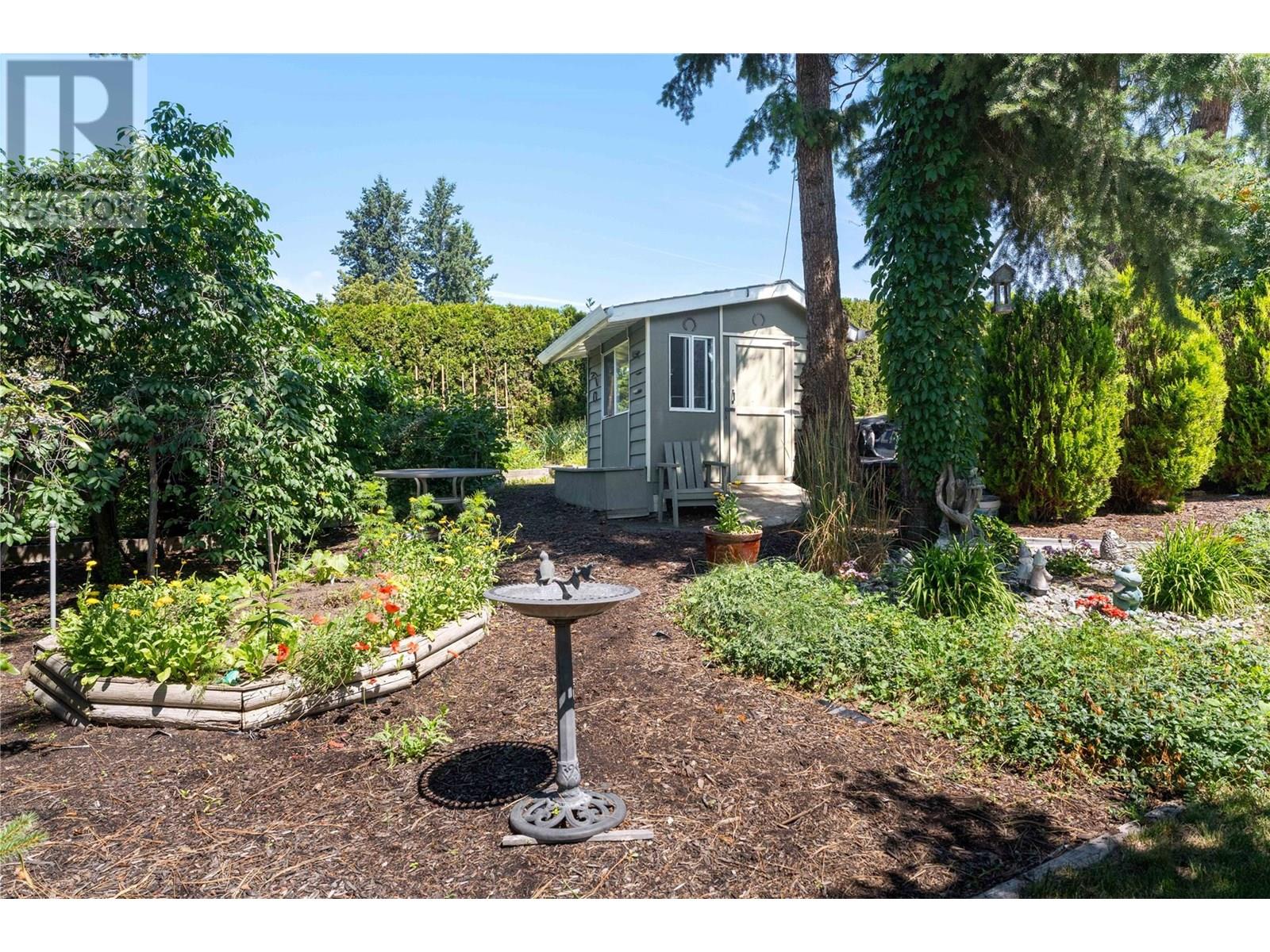 Photo 3 of 3942 Suncrest Court, Kelowna BC
