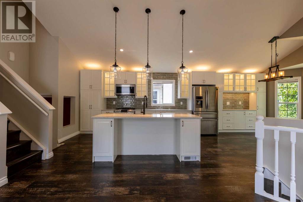 Single Family House 4 Level for Sale in  Erin Circle SE Erin Woods Calgary 