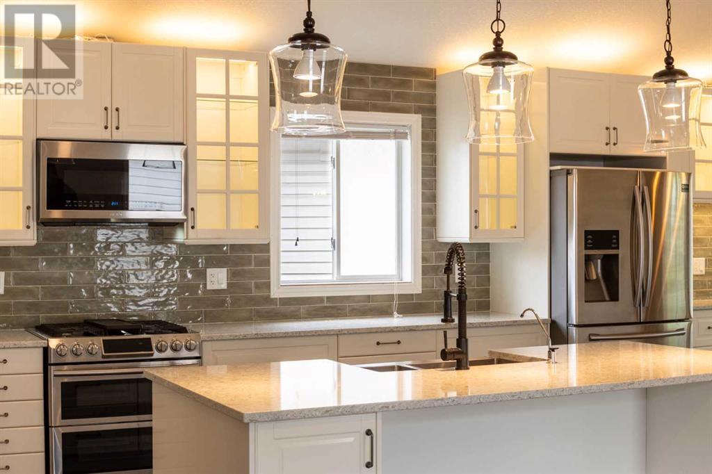 Single Family House 4 Level for Sale in  Erin Circle SE Erin Woods Calgary 