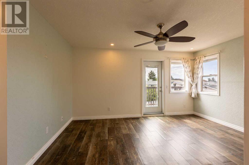 Single Family House 4 Level for Sale in  Erin Circle SE Erin Woods Calgary 