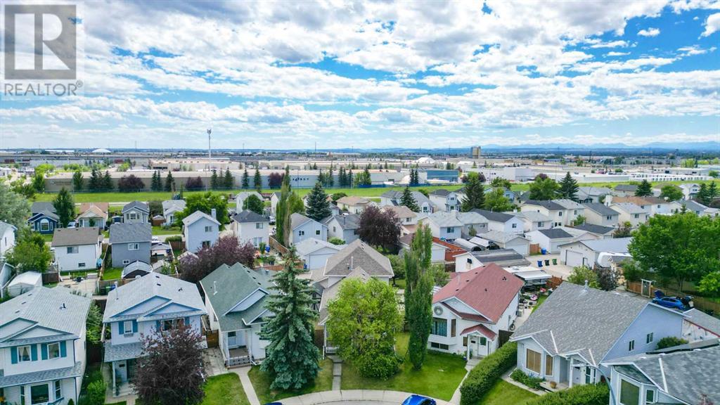 Single Family House 4 Level for Sale in  Erin Circle SE Erin Woods Calgary 