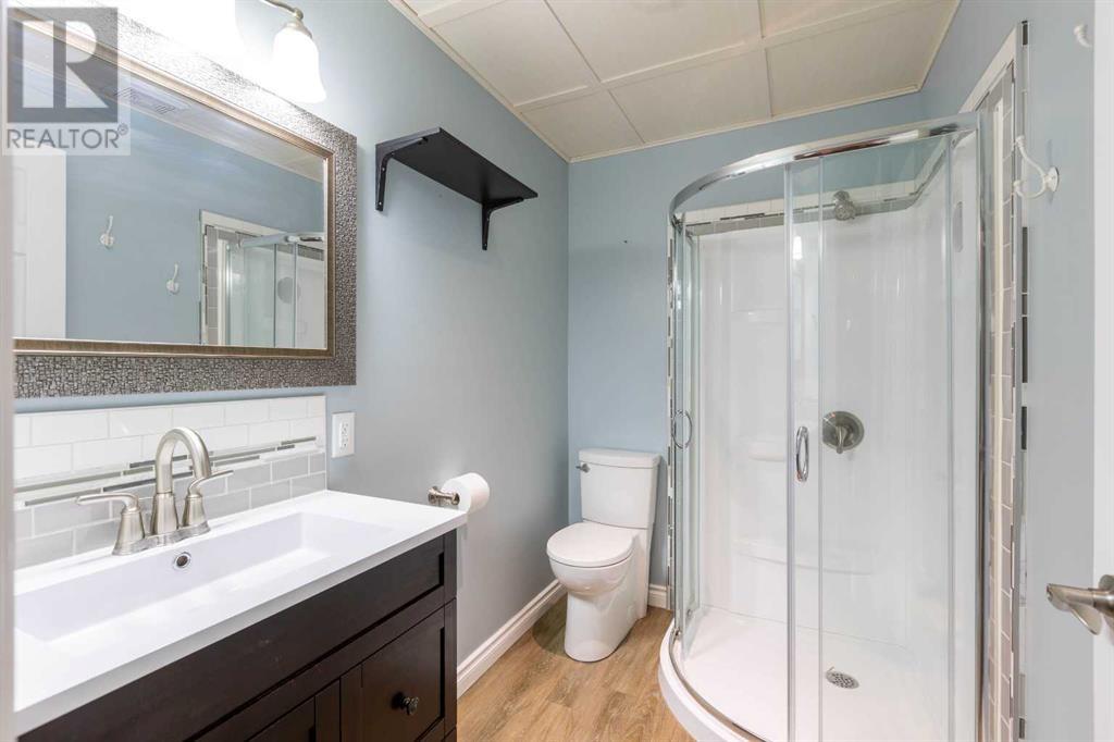 Single Family House 4 Level for Sale in  Erin Circle SE Erin Woods Calgary 