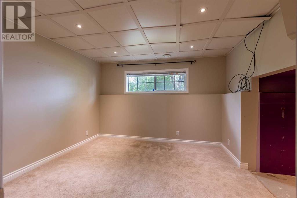 Single Family House 4 Level for Sale in  Erin Circle SE Erin Woods Calgary 
