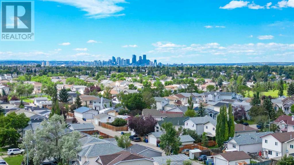 Single Family House 4 Level for Sale in  Erin Circle SE Erin Woods Calgary 