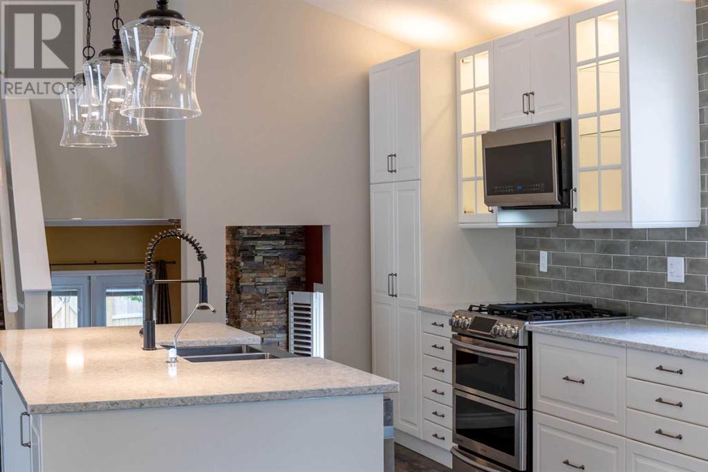 Single Family House 4 Level for Sale in  Erin Circle SE Erin Woods Calgary 