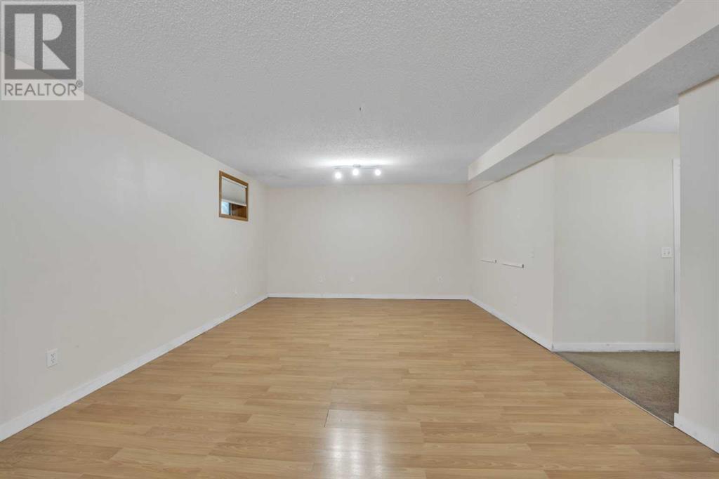 Single Family House Bi-level for Sale in  Coral Keys Drive NE Coral Springs Calgary 