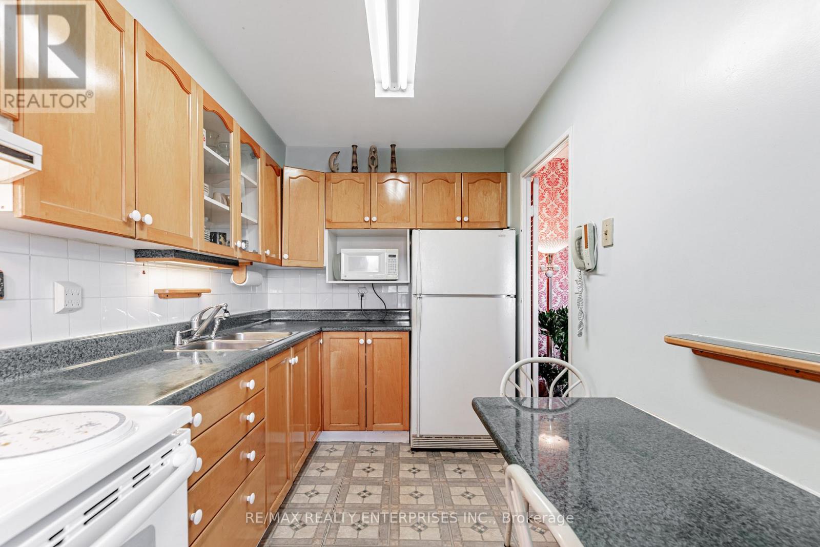 Photo 3 of 308 1 Massey Square, Toronto ON