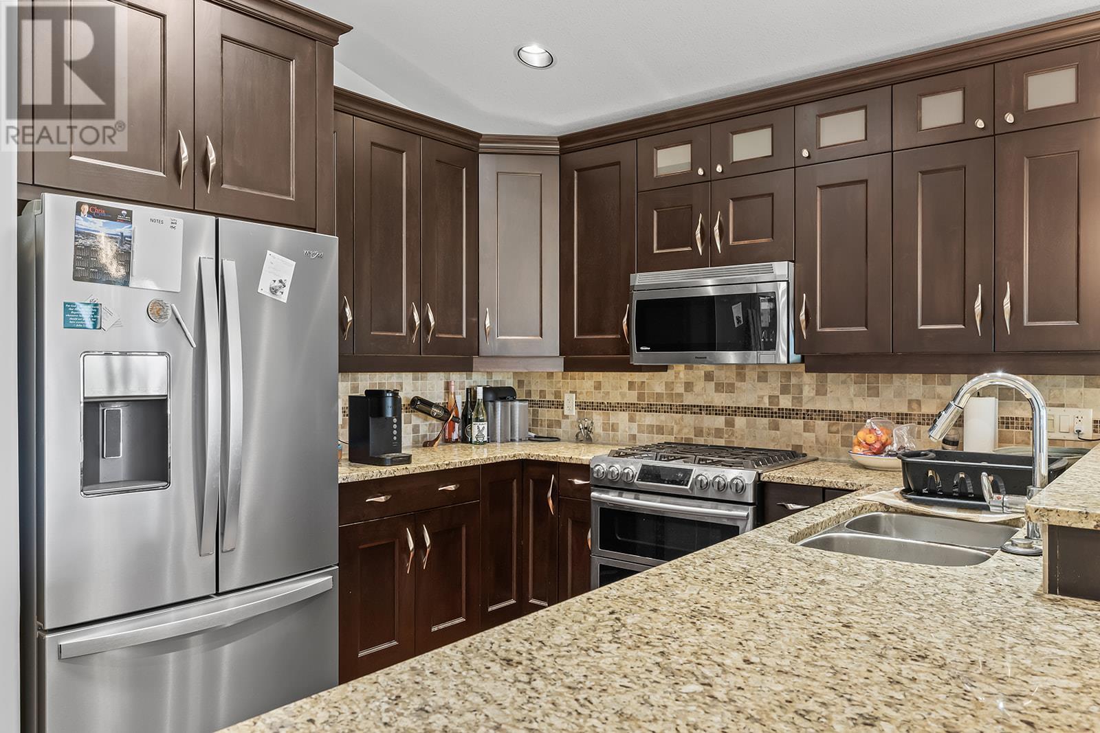 Photo 10 of 5318 Trickle Creek Drive, Kelowna BC