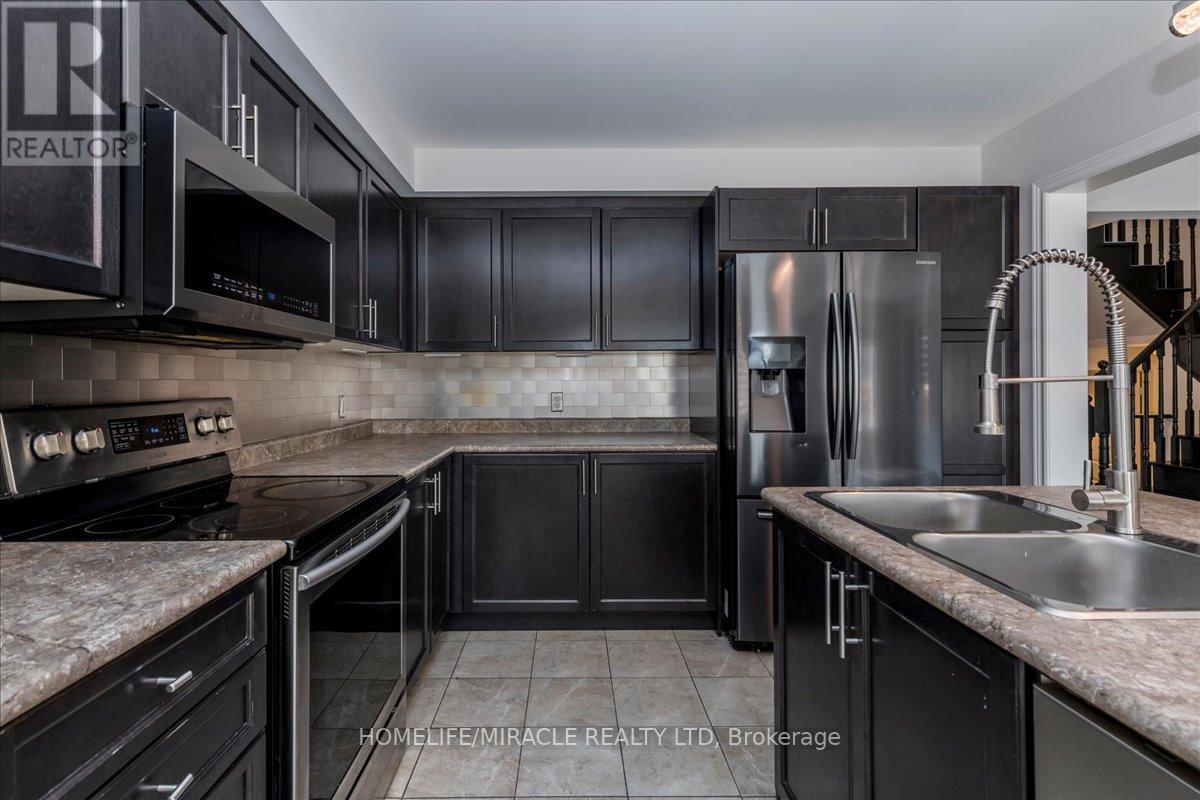Photo 4 of 83 Willoughby Way, New Tecumseth ON
