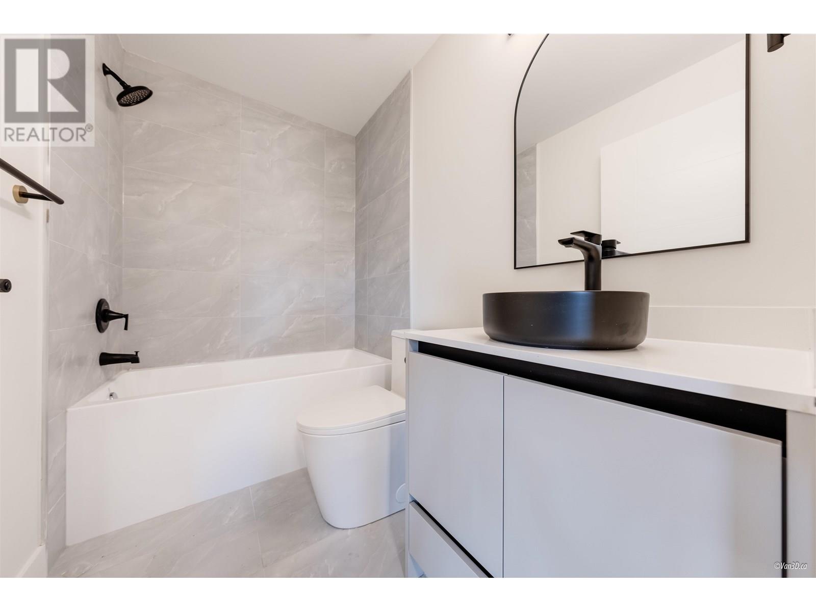 Photo 6 of 103 5092 Slocan Street, Vancouver BC