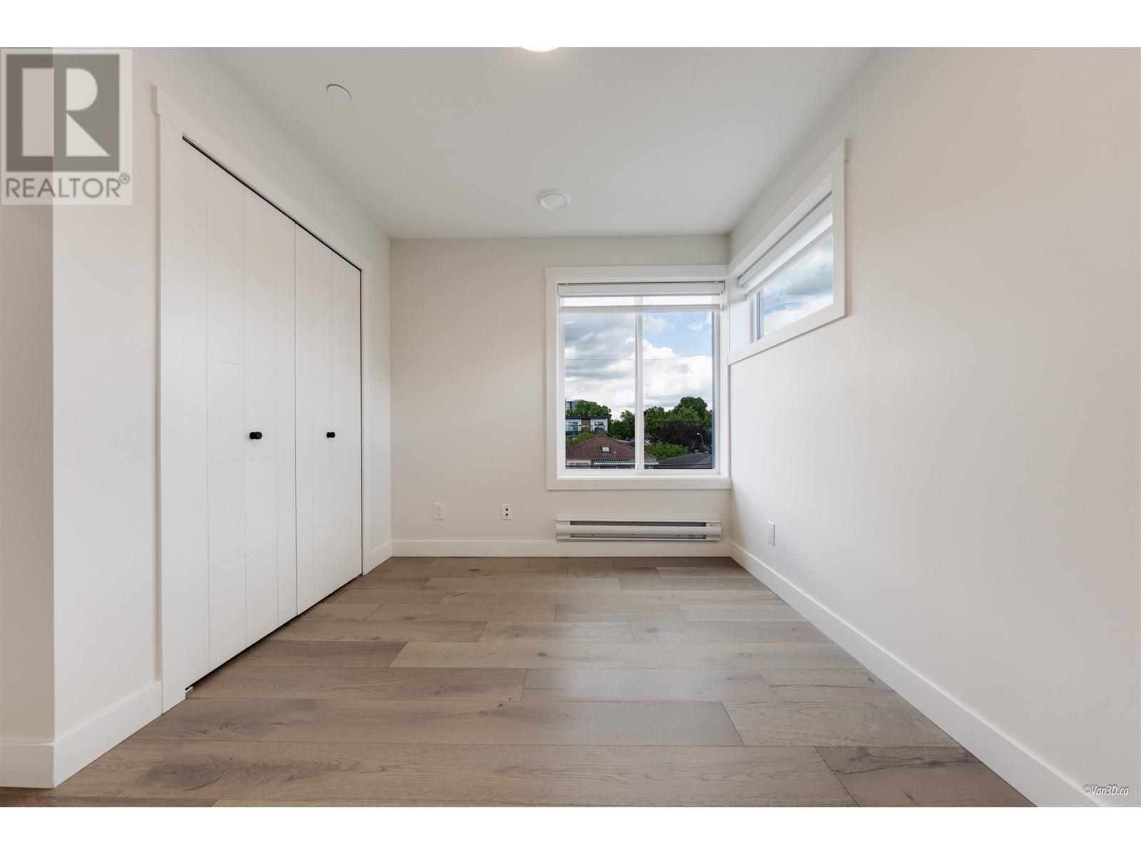 203 5092 SLOCAN STREET, Vancouver