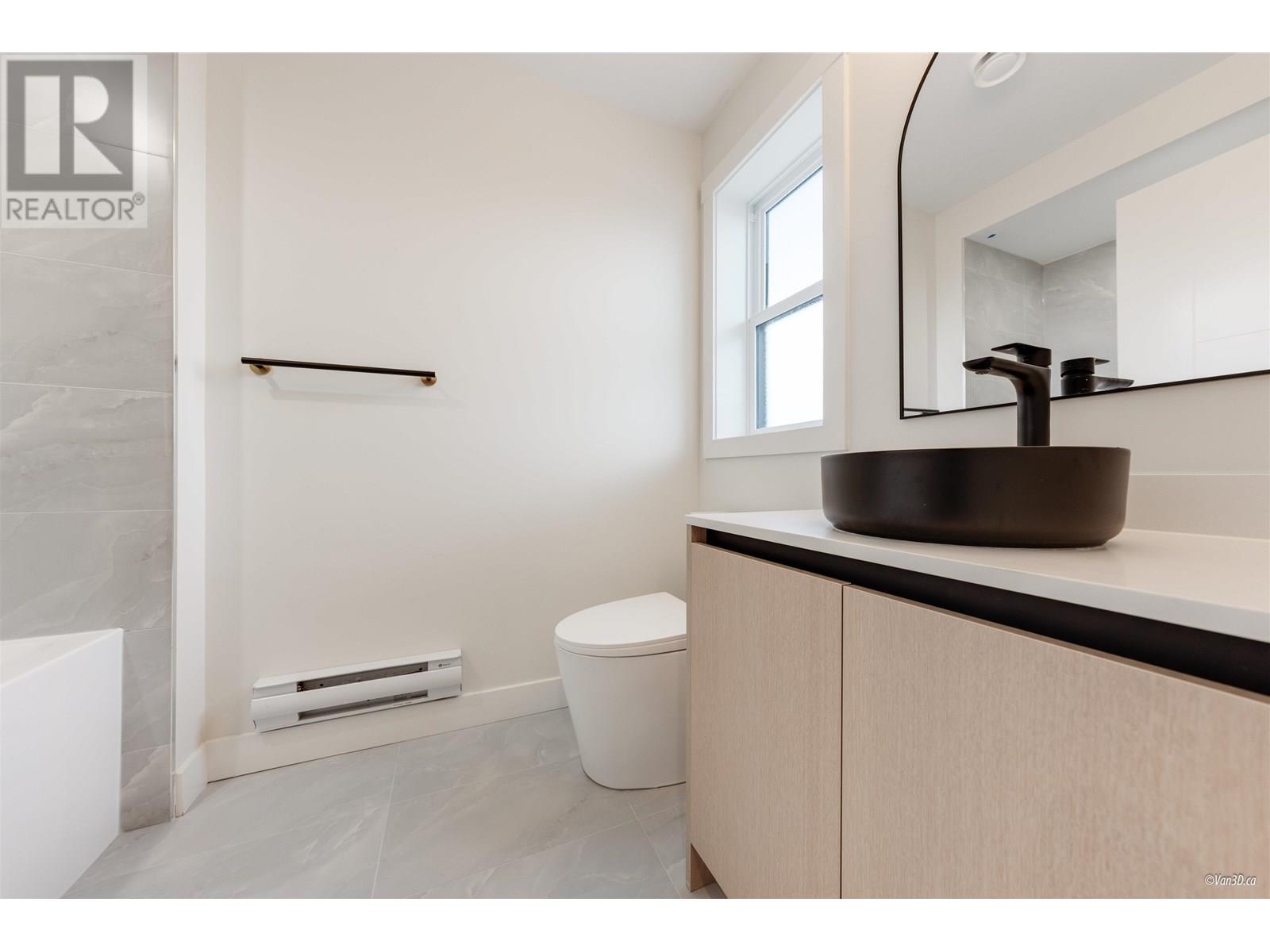 203 5092 SLOCAN STREET, Vancouver