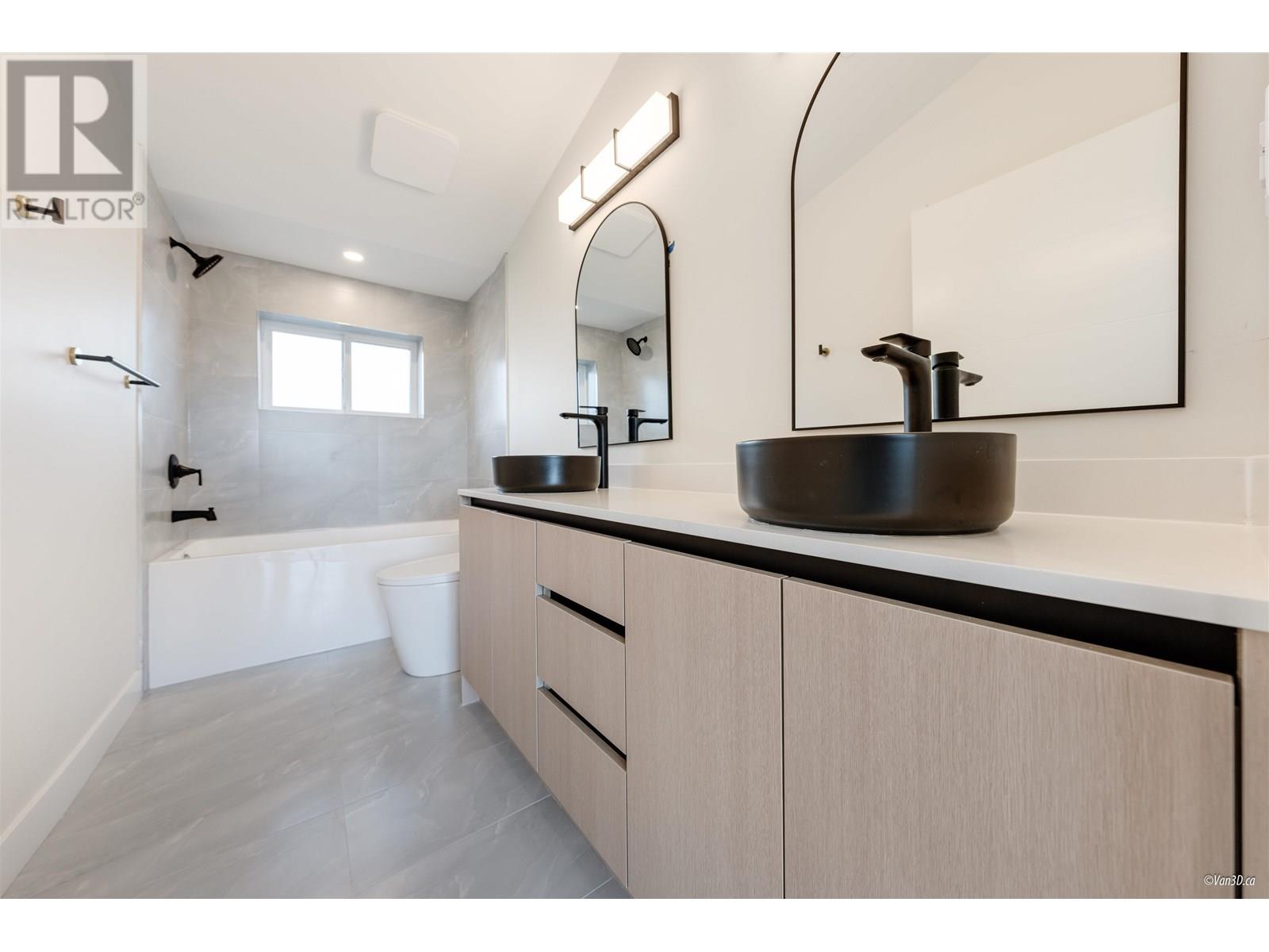 203 5092 SLOCAN STREET, Vancouver